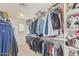 Walk-in closet that features shelves and hanging storage at 21610 N Bradford Dr, Maricopa, AZ 85138