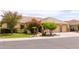 Beautiful single-Gathering home boasting desert landscaping, a three-car garage, and inviting curb appeal at 2203 E Tonto Pl, Chandler, AZ 85249