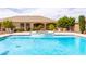 Backyard pool and spa area offering a serene and relaxing outdoor living space with desert landscaping at 2203 E Tonto Pl, Chandler, AZ 85249