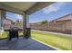 Inviting covered patio with built-in BBQ area, great for outdoor entertaining at 22463 E Desert Spoon Dr, Queen Creek, AZ 85142