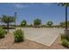 Community basketball court featuring full court lines, hoops, and landscaping at 22463 E Desert Spoon Dr, Queen Creek, AZ 85142