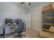 Bedroom with a comfortable office area and plenty of storage space at 22463 E Desert Spoon Dr, Queen Creek, AZ 85142