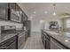 Chef's kitchen featuring granite countertops, stainless steel appliances, and a gas range at 22463 E Desert Spoon Dr, Queen Creek, AZ 85142