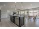 Contemporary kitchen island with stainless steel dishwasher and plenty of counter space at 22463 E Desert Spoon Dr, Queen Creek, AZ 85142