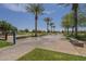Community splash pad with various water features, landscaping, and pedestrian access at 22463 E Desert Spoon Dr, Queen Creek, AZ 85142