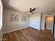 This bedroom features a ceiling fan and closet at 2337 E Manhatton Dr, Tempe, AZ 85282