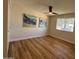 This standard bedroom has a ceiling fan and closet at 2337 E Manhatton Dr, Tempe, AZ 85282