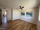 A standard-sized bedroom with a ceiling fan and closet at 2337 E Manhatton Dr, Tempe, AZ 85282