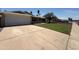 Charming single-story home with a two-car garage, well-maintained lawn, and mature landscaping in a desirable neighborhood at 2337 E Manhatton Dr, Tempe, AZ 85282