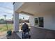 Covered back patio with BBQ perfect for outdoor cooking and entertaining at 2345 N 28Th Pl, Phoenix, AZ 85008