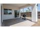 Covered back patio with BBQ perfect for outdoor cooking and entertaining with view of trees at 2345 N 28Th Pl, Phoenix, AZ 85008
