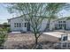 Modern home exterior with a well-manicured xeriscaped yard and spacious two-car garage at 2345 N 28Th Pl, Phoenix, AZ 85008