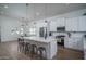 Bright and airy kitchen with stainless steel appliances and bar seating at 2345 N 28Th Pl, Phoenix, AZ 85008