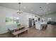Open concept kitchen with white cabinets, stainless steel appliances, and a center island at 2345 N 28Th Pl, Phoenix, AZ 85008