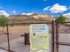 Welcoming dog park with clear signage and rules, providing a safe and enjoyable space for pets and their owners at 26409 N 49Th Ln, Phoenix, AZ 85083