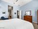 Bright primary bedroom with large window and neutral-toned decor at 26409 N 49Th Ln, Phoenix, AZ 85083