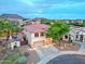 Beautiful two-story home with a three-car garage and landscaped yard in a serene community with mountain views at 27803 N 59Th Dr, Phoenix, AZ 85083