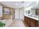 Spacious bathroom with tiled shower, soaking tub, double sinks, and granite countertops at 27803 N 59Th Dr, Phoenix, AZ 85083