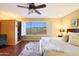 Sun-filled bedroom with wood floors, a window view, and an infrared sauna at 27803 N 59Th Dr, Phoenix, AZ 85083