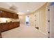 Spacious bonus room features built-in cabinets, ample lighting, and neutral carpeting at 27803 N 59Th Dr, Phoenix, AZ 85083