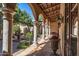 Picturesque courtyard featuring classic architecture, elegant lighting, and lush landscaping at 29 E Oakwood Hills Dr, Chandler, AZ 85248