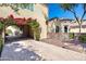 Charming brick driveway with a flower-covered archway leading to the property at 29 E Oakwood Hills Dr, Chandler, AZ 85248