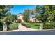 Charming exterior view showcasing manicured hedges, stone accents, and a well-maintained front lawn at 29 E Oakwood Hills Dr, Chandler, AZ 85248