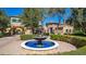 Stunning front yard featuring a beautiful fountain and meticulously landscaped grounds at 29 E Oakwood Hills Dr, Chandler, AZ 85248