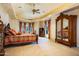 Spacious bedroom with ornate furnishings, carpeted floors, and natural light at 29 E Oakwood Hills Dr, Chandler, AZ 85248