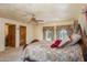 Spacious main bedroom featuring classic furnishings and large windows with drapes at 29 E Oakwood Hills Dr, Chandler, AZ 85248