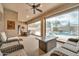 Relaxing covered patio with plenty of seating and a view of the pool at 2959 W Eastman Dr, Anthem, AZ 85086