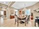 Formal dining room featuring a chandelier, tile flooring, and seating for eight guests at 2959 W Eastman Dr, Anthem, AZ 85086