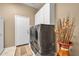 Functional laundry room with washer, dryer, and built-in white cabinets for storage, plus a decorative vase at 2959 W Eastman Dr, Anthem, AZ 85086