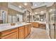 Bright bathroom with double vanities, a separate shower, and a soaking tub at 2959 W Eastman Dr, Anthem, AZ 85086