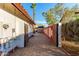 Private driveway entrance with brick pavers and privacy fence at 3037 E Mallory St, Mesa, AZ 85213