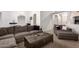 Comfortable living room features a sectional sofa, stylish coffee table, and bright, neutral decor at 3037 E Mallory St, Mesa, AZ 85213