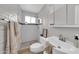 Updated bathroom featuring tile flooring, shower, toilet, and modern vanity at 3124 W Port Royale Ln, Phoenix, AZ 85053