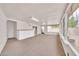 Spacious bonus room boasting white brick walls and natural light at 3124 W Port Royale Ln, Phoenix, AZ 85053
