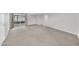 Bright living room featuring sliding glass door access to the exterior at 3124 W Port Royale Ln, Phoenix, AZ 85053