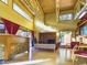 Spacious clubhouse with high ceilings, modern decor, a fireplace, and plenty of seating at 3500 N Hayden Rd # 206, Scottsdale, AZ 85251