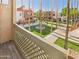 Balcony view overlooking a well-maintained courtyard with lush greenery and a central fountain at 3500 N Hayden Rd # 206, Scottsdale, AZ 85251