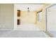 Bright dining area with tile floors, modern lighting, and sliding glass door to balcony at 3500 N Hayden Rd # 206, Scottsdale, AZ 85251