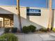Exterior view of the Sunrise Condominiums Fitness Center with lush landscaping at 3500 N Hayden Rd # 206, Scottsdale, AZ 85251