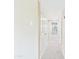 Hallway with white walls and carpet at 3500 N Hayden Rd # 206, Scottsdale, AZ 85251