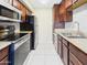 Modern kitchen with stainless steel appliances, granite countertops, and updated cabinetry at 3500 N Hayden Rd # 206, Scottsdale, AZ 85251
