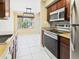 Bright, modern kitchen with stainless steel appliances, granite countertops, and updated cabinetry at 3500 N Hayden Rd # 206, Scottsdale, AZ 85251