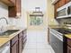 Well-lit kitchen featuring stainless steel appliances, granite countertops, and stylish backsplash at 3500 N Hayden Rd # 206, Scottsdale, AZ 85251