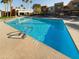 Large community pool with clear blue water and plenty of lounge seating for residents to enjoy at 3500 N Hayden Rd # 206, Scottsdale, AZ 85251