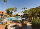 Resort-style community pool with ample lounge seating and beautifully landscaped surroundings at 3500 N Hayden Rd # 206, Scottsdale, AZ 85251