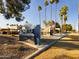 Elegant community signage for Sunrise Condominiums with well-maintained landscaping at 3500 N Hayden Rd # 206, Scottsdale, AZ 85251